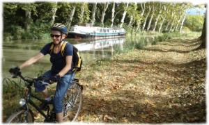 Peaceful bike ride under the plane trees of the canal midi